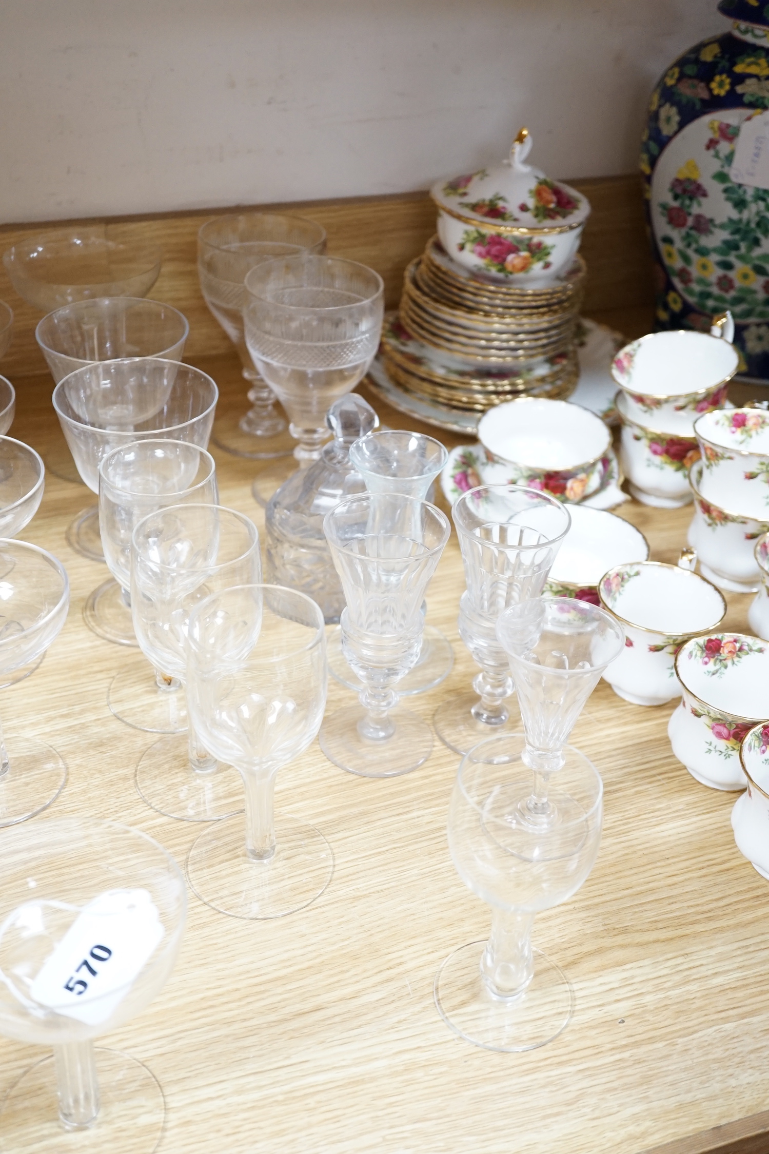 A group of 19th century and later glasses and a George III glass butter tub and cover